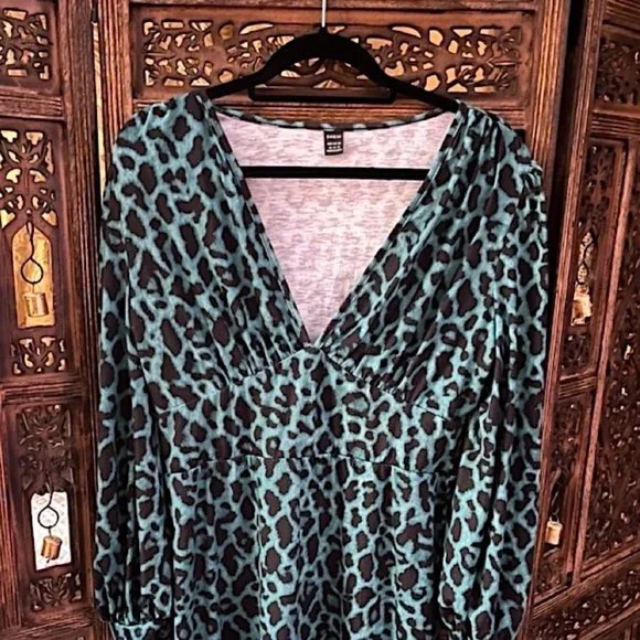 slim fit dress slacks Sail to Sable Animal Print Long Sleeve Smocked Waist Midi Dress with Tassels Black Animal Print / XXXL / H23172 main image 1
